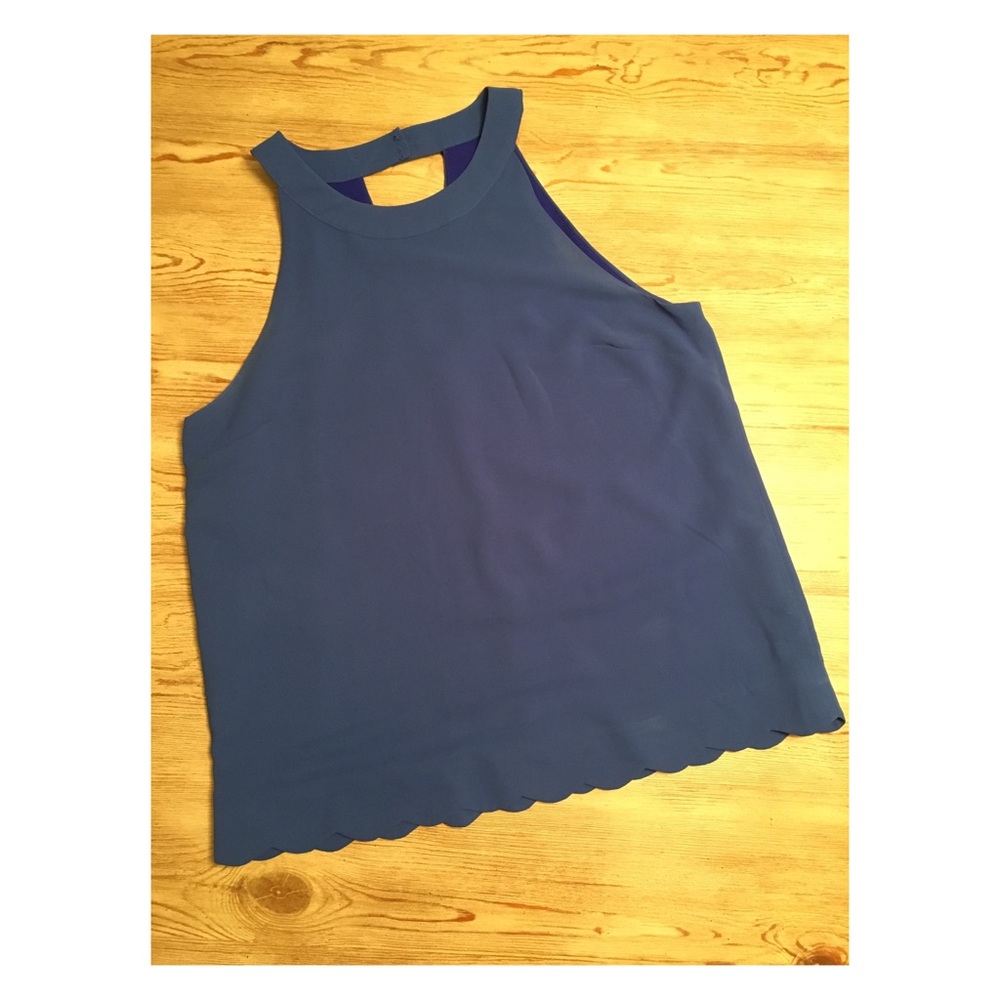 Scalloped sleeveless blouse